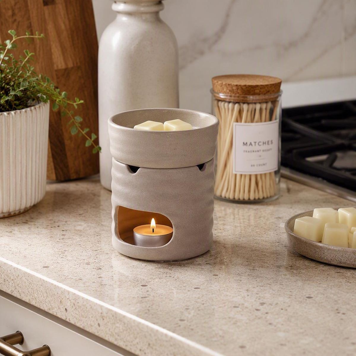 Luxury Salted Caramel Wax Melt Burner Gift Set featuring a ceramic burner and highly scented wax melts. Beautifully gift boxed and perfect for gifting.